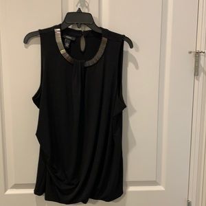 Black sleeveless top with silver embellishments
